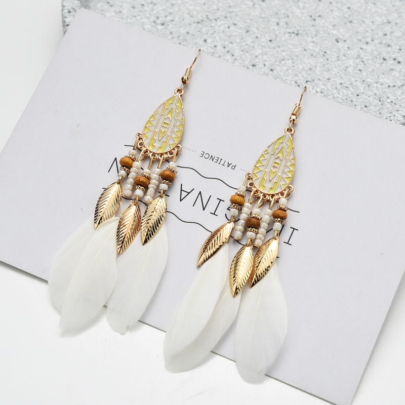 White Feathers + Teardrop